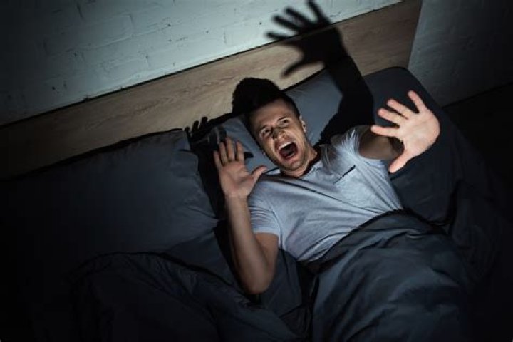 Should I wake someone having a nightmare?